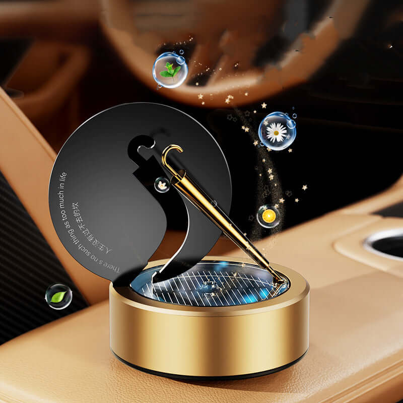 Solar rotating aromatherapy car air freshener in obsidian black and gold, designed for a luxurious interior scent experience.